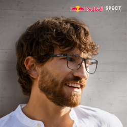 Grafik zur Bewerbung der Brillen von Red Bull Spect. Ein Mann trägt eine Brille  von Red Bull Spect und lächelt in die Ferne.