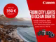 Strand mit Häusern und Bergen. Daneben steht folgender Text: "Bis zu 350€ Rabatt. From City Lights to Ocean Sights. Kaufe zwischen dem 01.05. und 25.05.2025 ein Aktionsprodukt und spare bis zu 350€." Zusätzlich sind zwei Kameras und vier Objektive von Canon zu sehen.