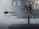 DJI RS 3 PRO Gimbal mit Straßenbahn im Hintergrund und textlichem Slogan „Nothing Out of Reach“