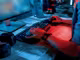 Mann vor PC sitzend mit Gaming Zubehör