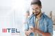  junger Mann in heller Büroumgebung schaut auf Smartphone neben MTEL Austria Logo
