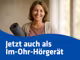 Eine Frau hält eine Yogamatte in der Hand und lächelt in die Kamera. Darunter steht folgender Text: "Jetzt auch als Im-Ohr-Hörgerät."