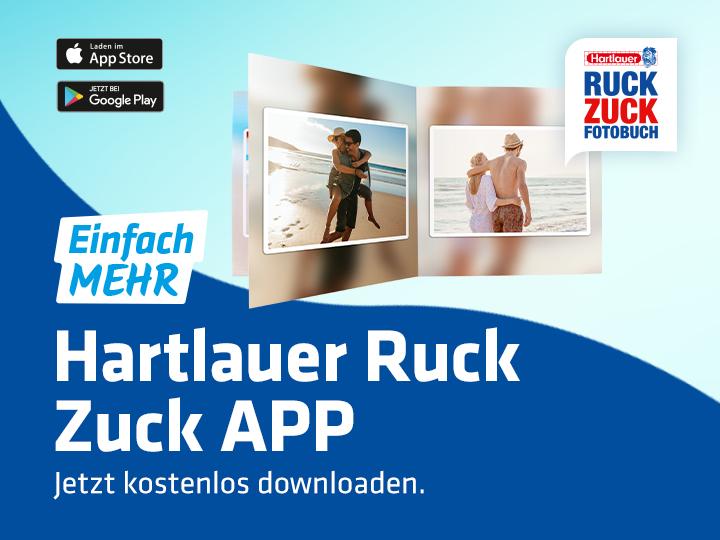 Ruck Zuck Fotobuch mit Strandfotos neben Hinweis auf die Hartlauer Ruck Zuck App