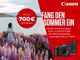 Aktionsgrafik von Canon mit folgendem Text auf rotem Hintergrund: "Bis zu 700&euro; Cashback. Fang den Sommer ein. Kaufe zwischen dem 11.05. und 12.07.2026 ein Aktionsprodukt und spare bis zu 700&euro;." Zus&auml;tzlich sind eine Kamera sowie ein Objektiv von Canon abgebildet. Im Hintergrund befindet sich eine Frau in einem Fliederfeld vor einem See.