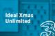 Tarif Drei Xmas Unlimited und Drei-Logo vor unscharfem türkisem Hintergrund mit Handyabteilung in Hartlauer Geschäft