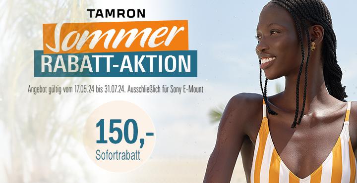 Eine Frau schaut in die Ferne und lächelt. Auf der Grafik steht folgender Text: "Tamron Sommer Rabatt-Aktion. Angebot gültig vom 17.05.2024 bis 31.07.2024. Ausschließlich für Sony E-Mount. 150,- Sofortrabatt."