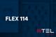 Tarif Flex 114 und MTEL-Logo vor unscharfem dunkelblauem Hintergrund mit Handyabteilung in Hartlauer Geschäft